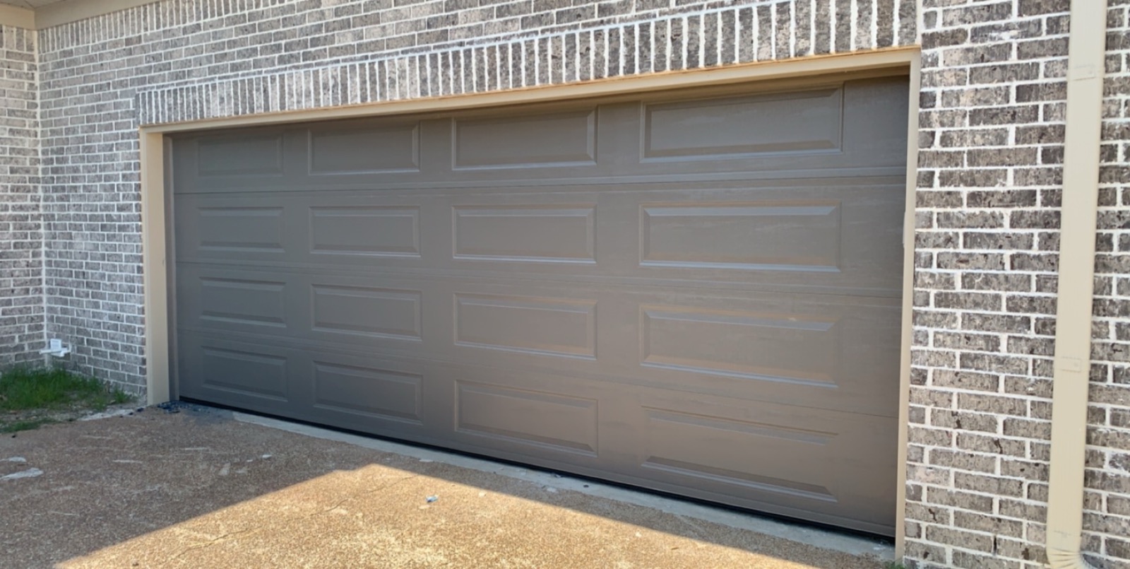 New Install Long Panel Residential garage door MidSouth Door Co.